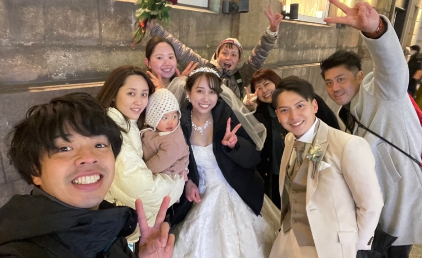 ウェディングの方とスタッフの写真